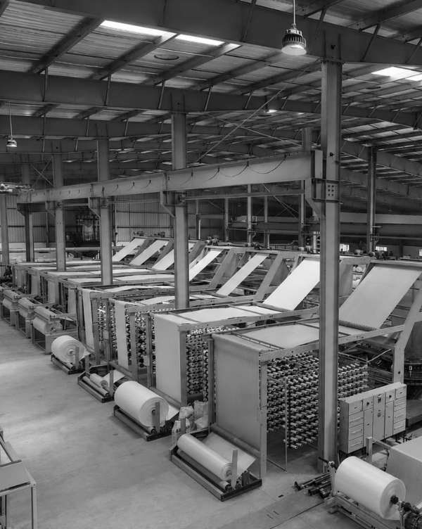 Advanced FIBC jumbo bag manufacturing facility with automated PP woven fabric production machinery and industrial bulk packaging equipment.