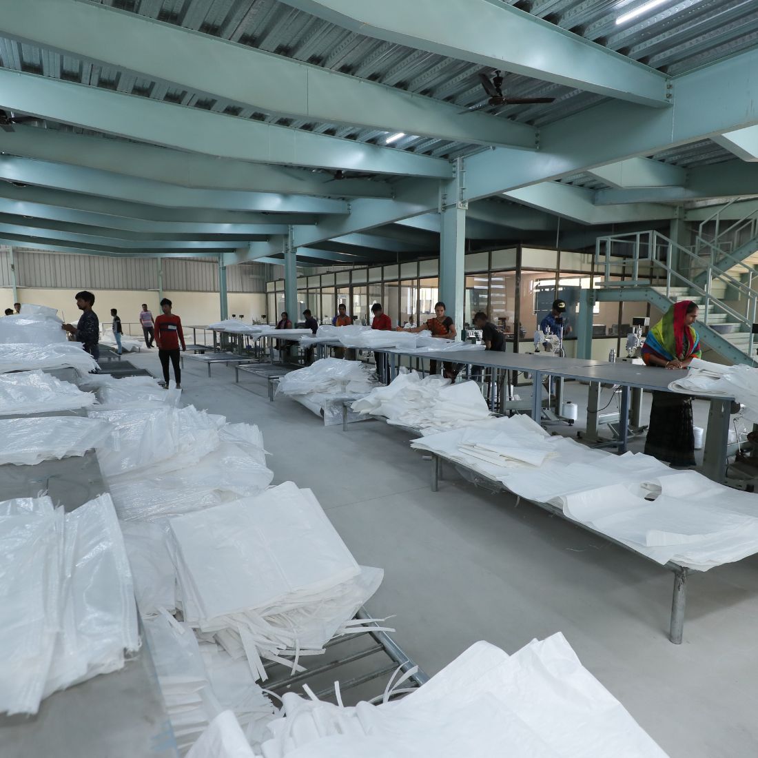 Industrial FIBC jumbo bag stitching and finishing unit with large scale production setup